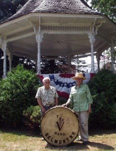 Belmont NAtive Wallice Rhodes and Linda Frawley of the Belmont Heritage Commission stand in from of the town bandstand Tuesday with the drum formal used by the town band . (Dan Seufert/Union Leader)